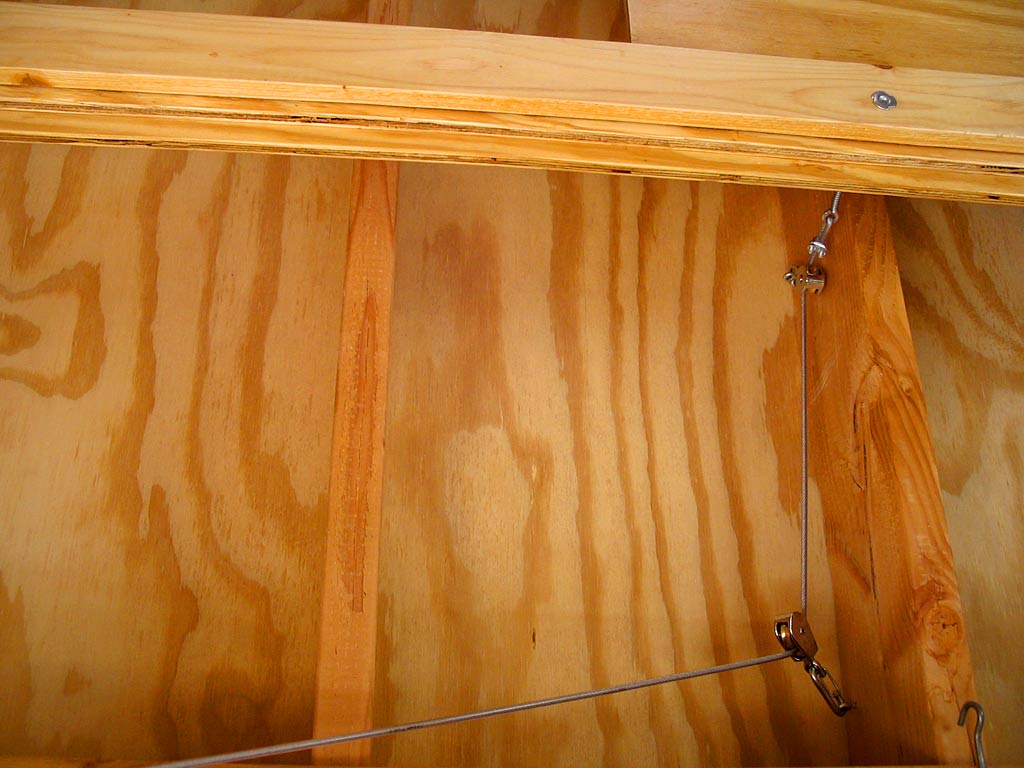 This cable and pully system pulls the wall up out of the way