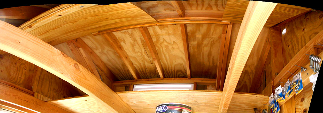 The dormer with its wall hinged out and up