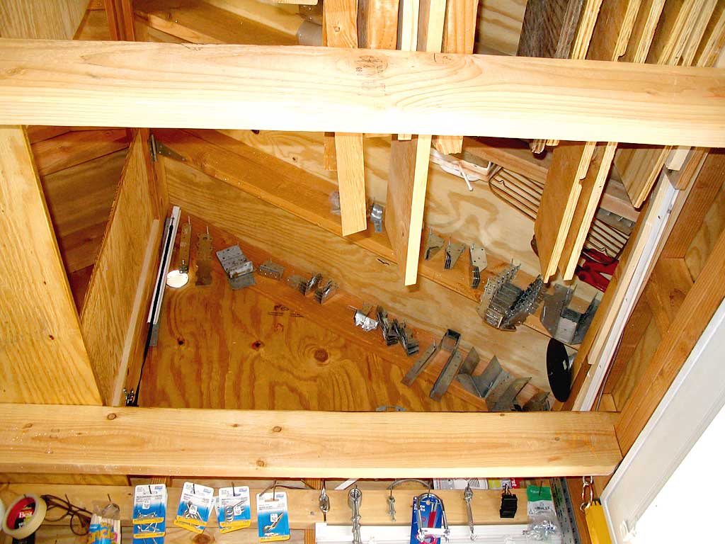 The dormer with its wall hinged out and up